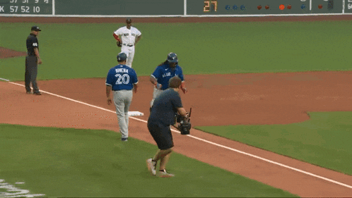 a baseball player with the number 20 on the back of his shirt