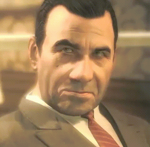 a man in a suit and tie is looking at the camera with a serious look on his face .
