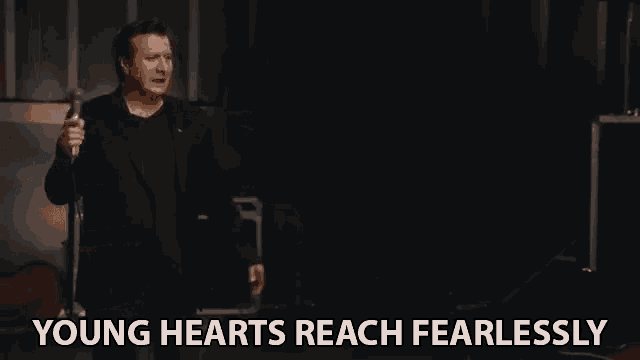 Young Hearts Reach Fearlessly Young Love GIF - Young Hearts Reach Fearlessly Young Love Romantic Song GIFs
