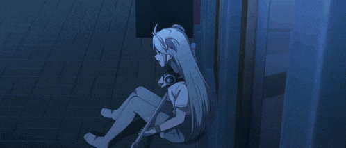 a girl with pigtails is sitting on the ground holding a guitar