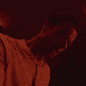 a close up of a man 's face with the word five visible