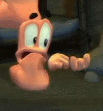 a close up of a cartoon character with a surprised look on his face