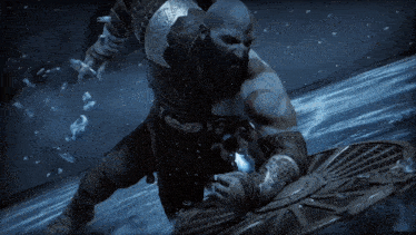 a man with a beard is holding a large sword