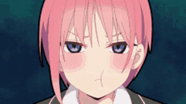a close up of a girl with pink hair and blue eyes making a face .