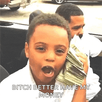 a young boy is holding a stack of money in his mouth and making a funny face .