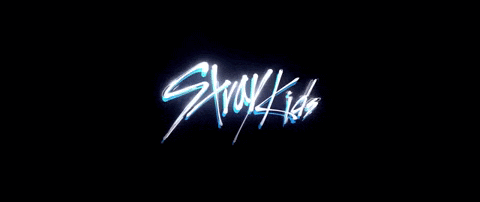 the logo for stray kids is glowing in the dark .