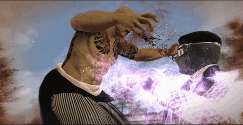 a man with a tattoo on his arm is being hit by another man