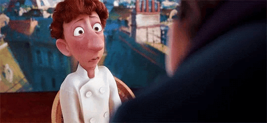 a cartoon character from the movie ratatouille is sitting in a chair talking to another person .
