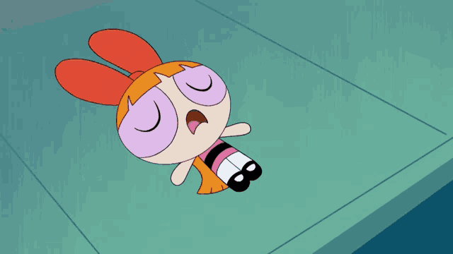 a cartoon character is laying on a green surface with her eyes closed