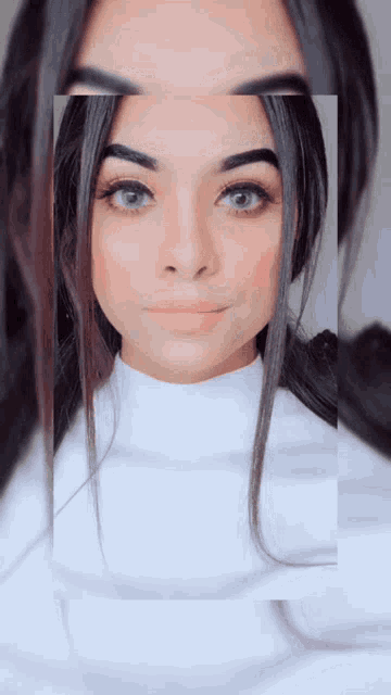 a close up of a woman 's face with a square around it