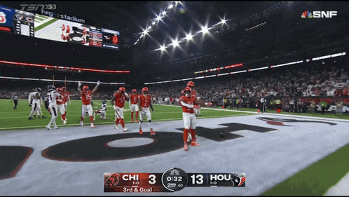 a football game is being played and the score is 13 to 3