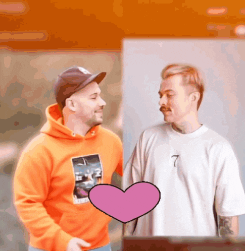 a man wearing an orange hoodie has the number 7 on his t-shirt