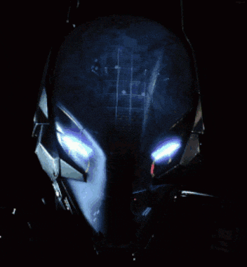 a close up of a batman helmet with blue lights on