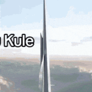 an aerial view of a very tall building with the words kule written on it