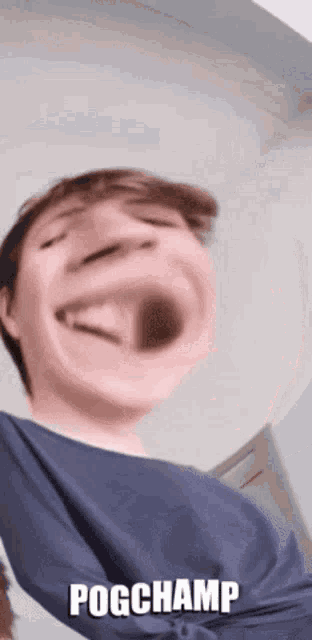 a person making a funny face with the word pogchamp on the bottom right