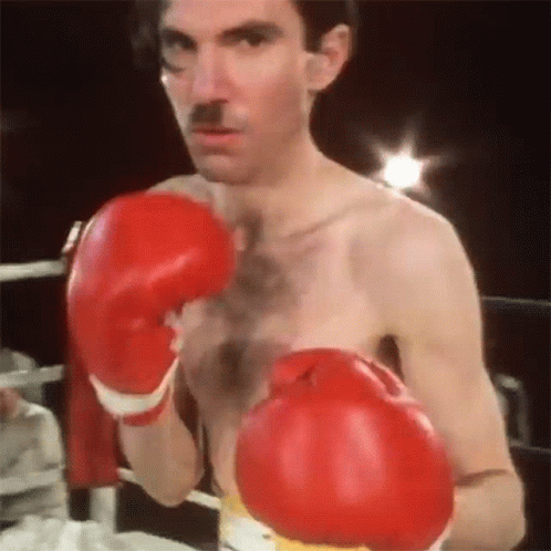 Punch Ron Mael GIF - Punch Ron Mael The Sparks Brothers GIFs