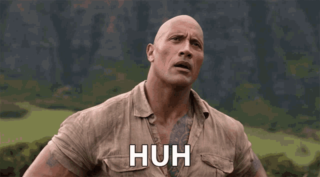 a bald man with a tattoo on his chest says huh