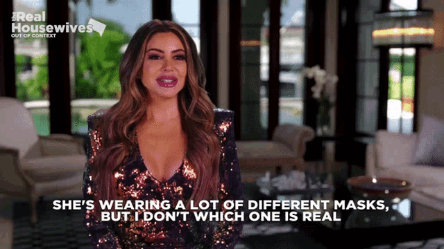 a woman wearing a sequined top says she 's wearing a lot of different masks