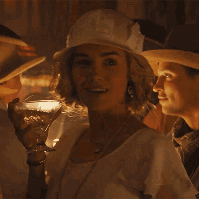 a woman wearing a white hat and pearls says i want to try