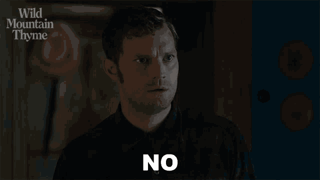 a man with a surprised look on his face is saying no