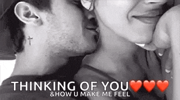 a man and a woman are kissing and thinking of you .