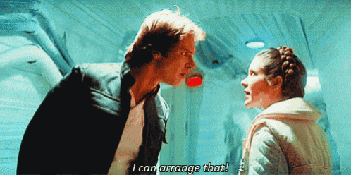 a man and a woman are standing next to each other and the woman is saying `` i can arrange that ! ''