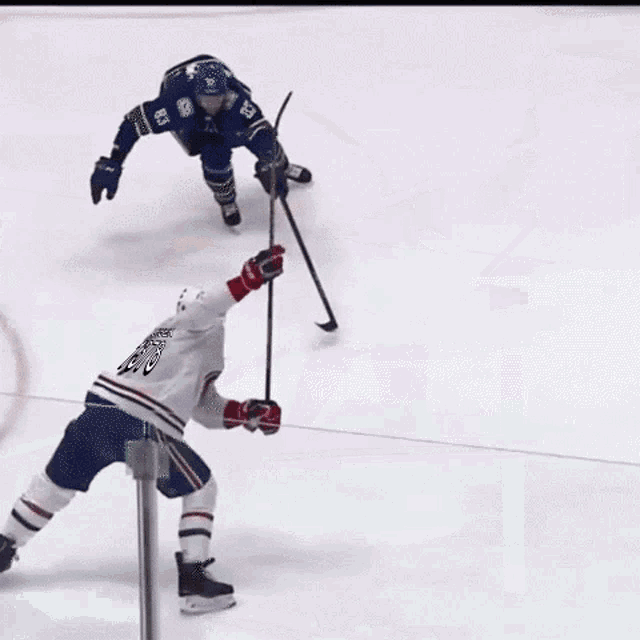 a hockey goalie is getting ready to make a save and the word appr is on the ice