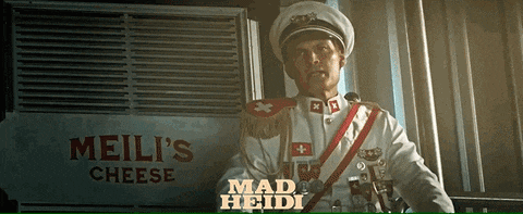 a man in a military uniform is standing in front of a sign that says meili 's cheese