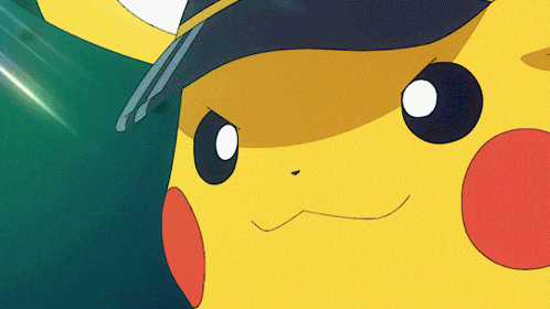 a close up of a yellow cartoon character wearing a hat