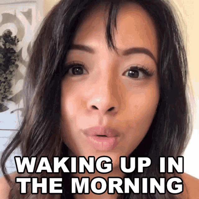 a woman with a surprised look on her face and the words waking up in the morning above her