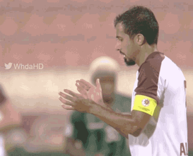 a soccer player wearing a jersey with the number 1 on it