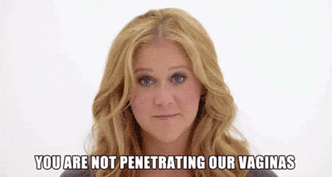 a woman is making a funny face while talking about penetrating her vagina .