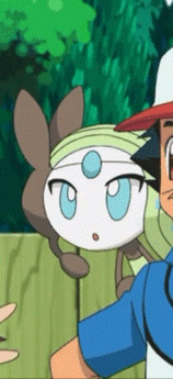 a cartoon character with a blue eye is being held by ash