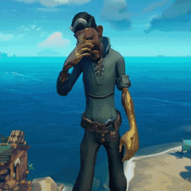 a man in a video game covering his face with his hands