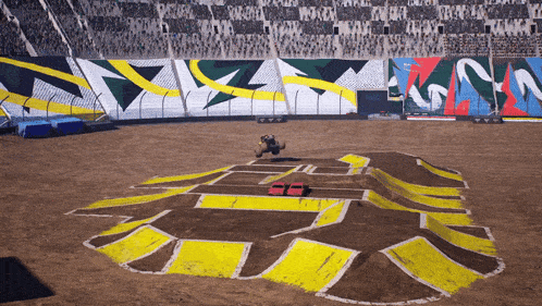 a dirt track with a lion on the ground
