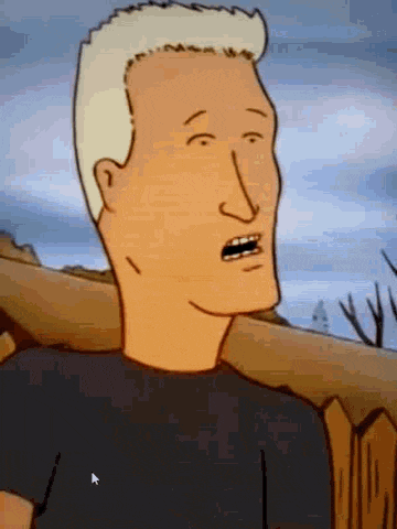 a cartoon character is standing in front of a wooden fence and making a funny face .