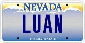 a nevada license plate with mountains in the background and the name luan on it .