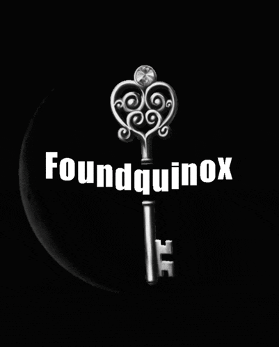 a black and white photo of a heart shaped key with the words foundquinox below it