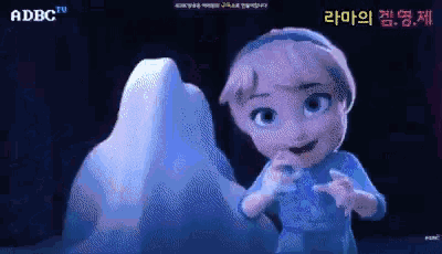 an ad for adbc tv shows a little girl standing in front of an ice sculpture