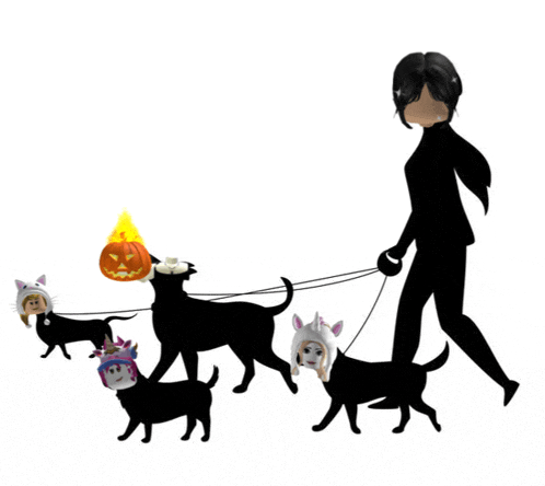 a woman is walking a group of black dogs with halloween hats on