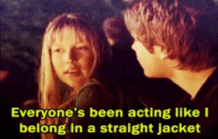 a boy and a girl are looking at each other and the girl says everyone 's been acting like i belong