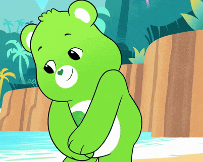 a green care bear is standing in front of a waterfall