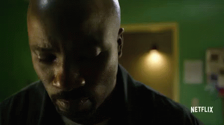 Looking Around GIF - Luke Cage Mike Colter Turn Back GIFs