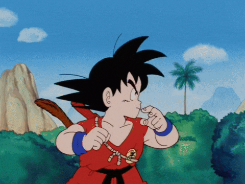 a cartoon character named goku is wearing a red shirt