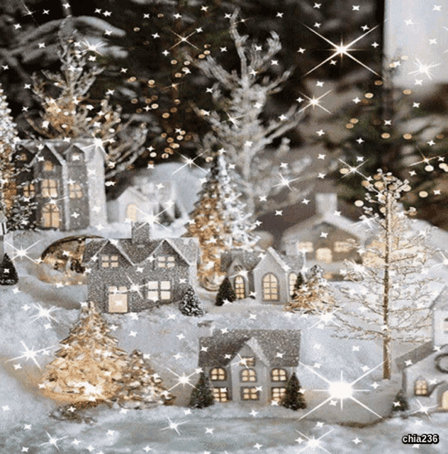 a christmas scene with houses and trees is displayed by chia236
