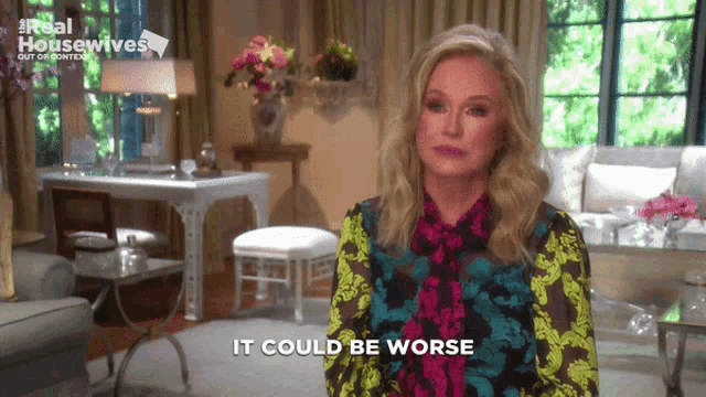a woman says it could be worse in front of a real housewives logo