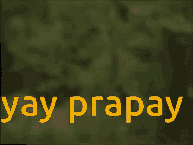a boy in a striped shirt says yay prapay with his hands in the air