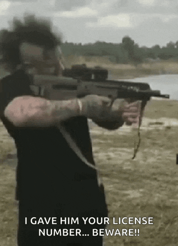 a man is holding a gun in a field and saying i gave him your license number ... beware !