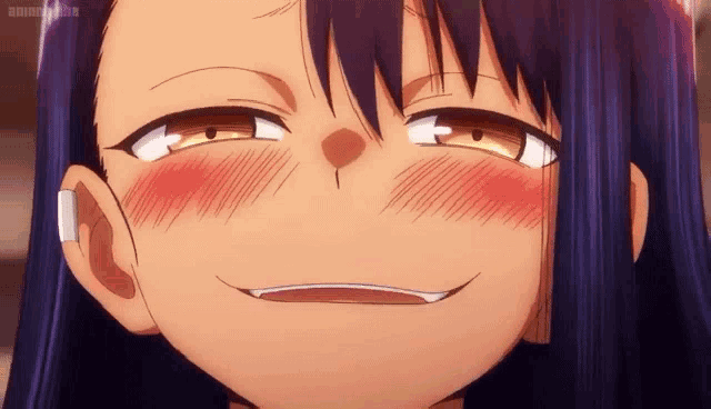 a close up of a girl making a funny face with her eyes closed
