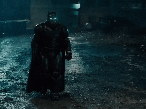 batman and superman are standing in the rain in a scene from the movie batman v superman dawn of justice .